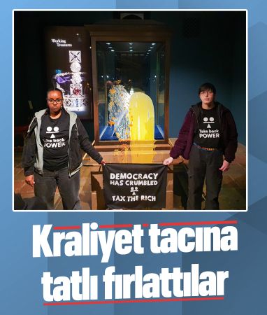 Londra'da sergilenen Kraliyet Tacı'na tatlı fırlattılar