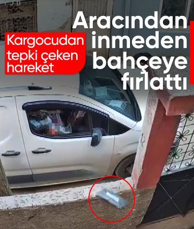Adana'da kargocunun paketi aracından inmeyip bahçeye fırlattığı anlar kameraya yansıdı