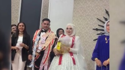 Erzincan'da bir garip takı töreni: Geline ayçiçek yağı taktı
