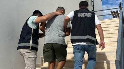 Interpol'ün kırmızı bültenle aradığı dolandırıcı Muğla'da yakalandı