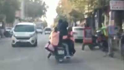 Adıyaman'da trafik skandalı: Bir motosiklete 4 kişi bindiler