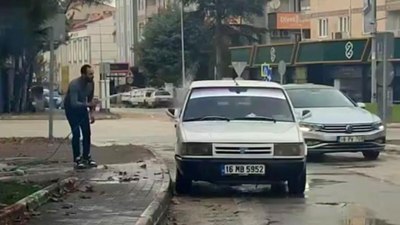 Bursa'da çeşme suyuyla aracını yıkayan Suriyeli sürücüye ceza