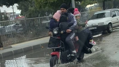 6 kişilik aile bir motosiklette