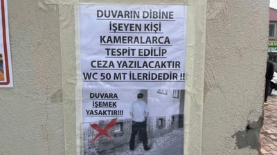 Kayseri'de iş yerine 'duvarlar tuvalet değildir' afişini astı