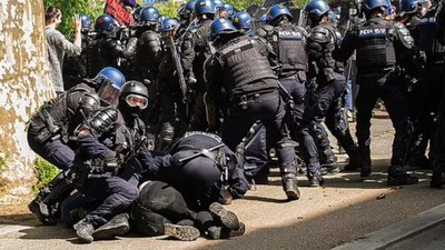 Fransız polisi, 1 Mayıs gösterilerinde protestoculara şiddet uyguladı