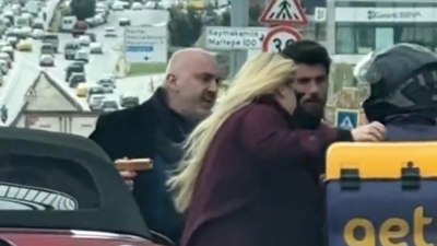 Otomobil sürücüsü tartıştığı kuryeye silah çekti