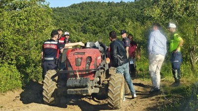 Bursa'da babasının kullandığı traktörün altında kalan çocuk yaşam savaşı veriyor