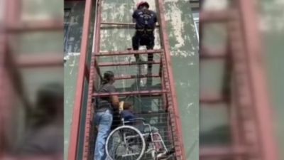 Adana'da asansörde mahsur kalan anne ile engelli oğlu kurtarıldı