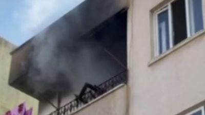 Mersin'de kiracı evi ateş verdi, mahalleli tepki gösterdi