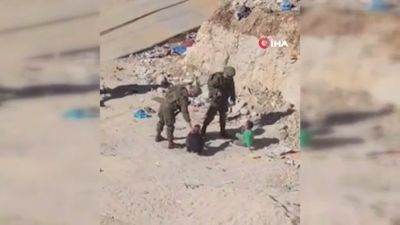 İsrail askerleri iki çocuğa şiddet uygulayıp yerlerde sürükledi