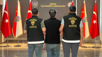 Mersin'de 31 yıl hapis cezasıyla aranan dolandırıcı yakalandı