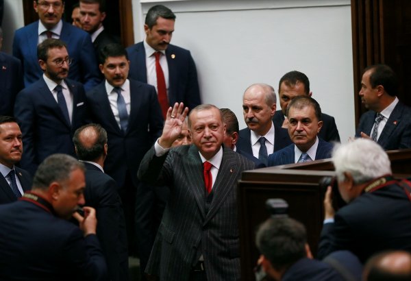 a Erdoğan: Ekonomideki dalgalanmayı atlatacağız