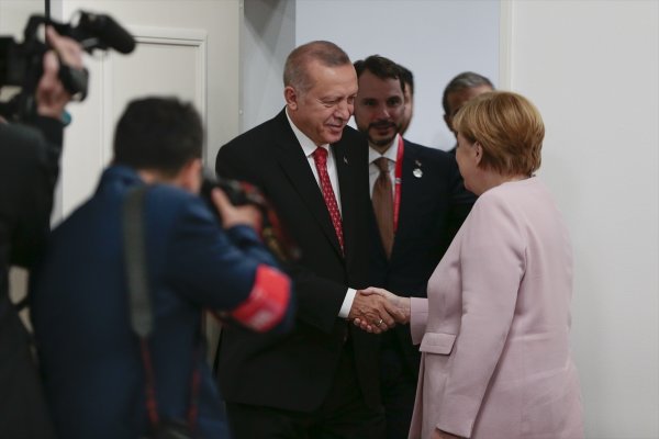 a Cumhurbaşkanı Erdoğan, Merkel ile görüştü