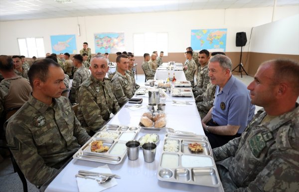 a Hulusi Akar KKTC'de: Komşularımız aklını başına alsın