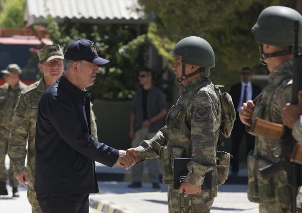 a Hulusi Akar KKTC'de: Komşularımız aklını başına alsın