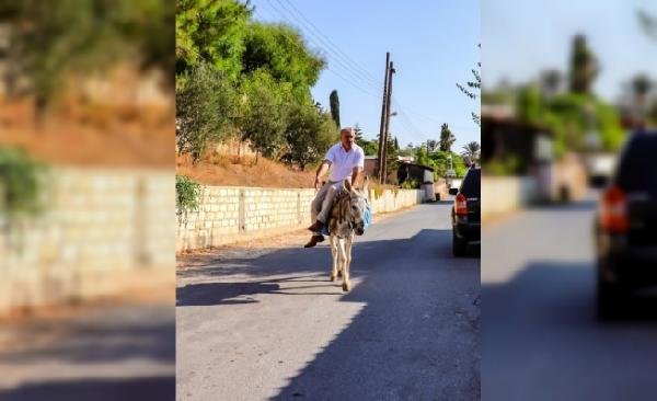 Makam aracı giden başkan eşekle yoluna devam etti