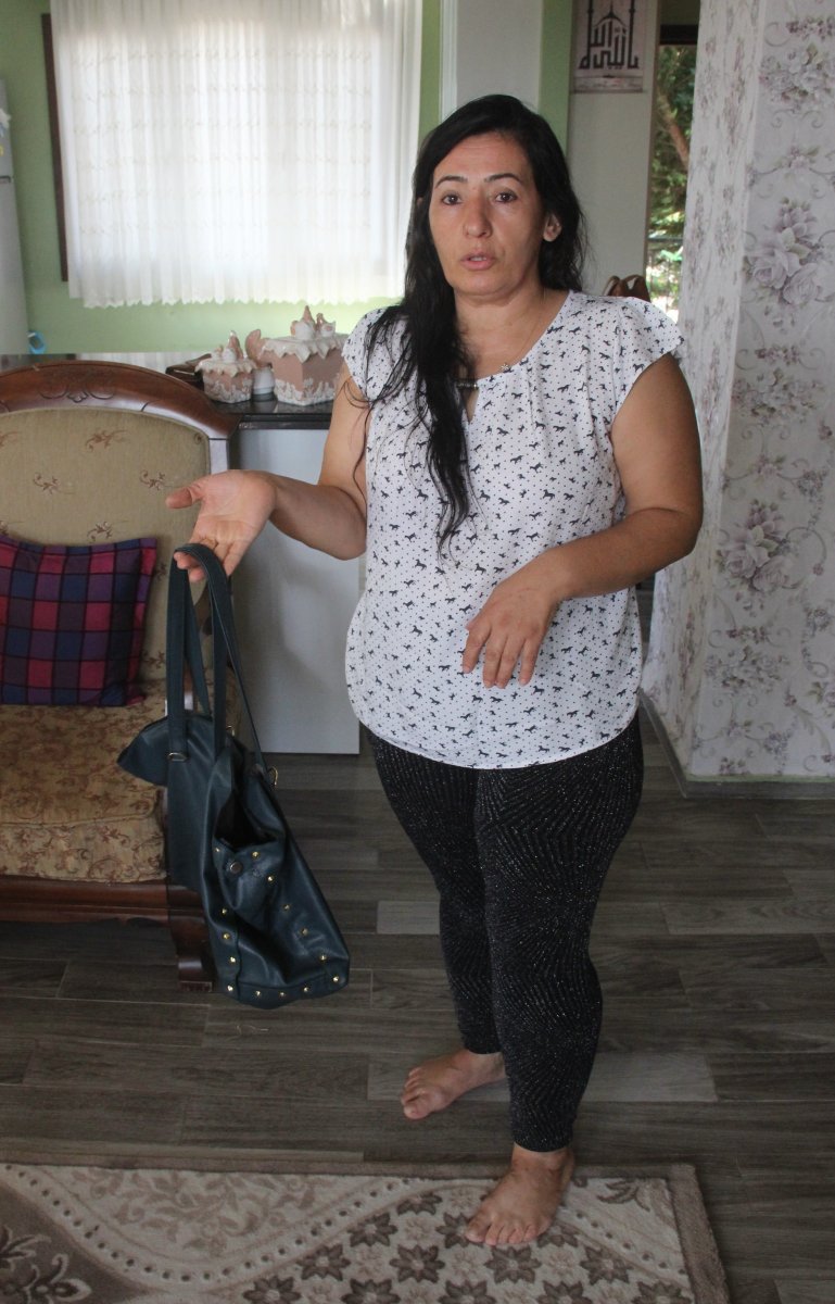 i Eşine çanta fırlatan kadın 3 bin TL ceza ödedi