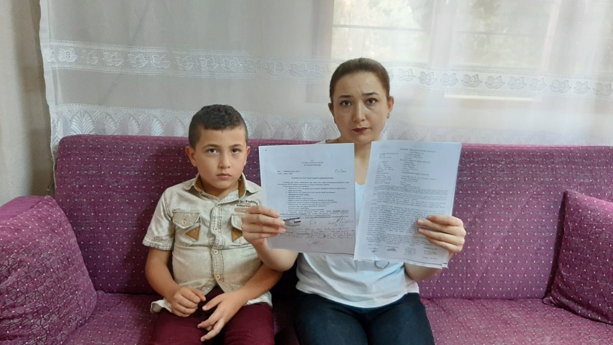 i Oğluyla tartışan 9 yaşındaki çocuğu yumrukla dövdü