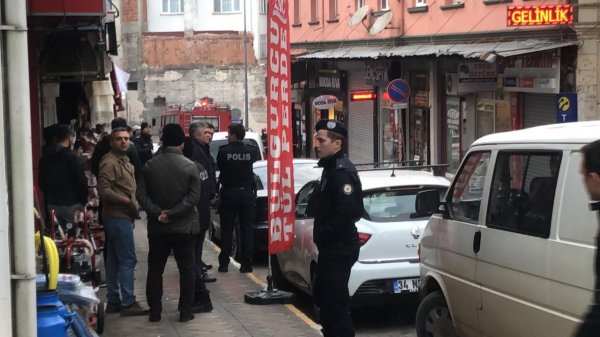 i Elinde tüfek ve benzin bidonuyla dükkan bastı
