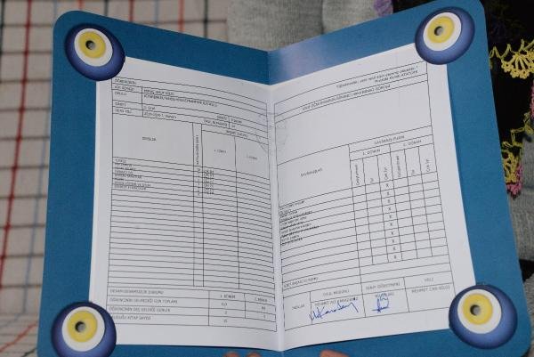 d Şırıngalı çikolatayla ölen Umut'un karnesini annesi aldı