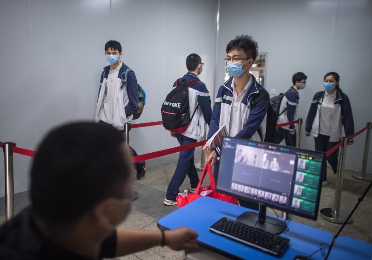 Koronavirüsün çıktığı Vuhan'da okullar açıldı