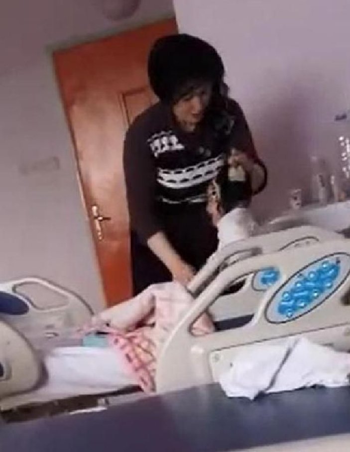 Hasta bebeğini ağladığı için döven kadın serbest