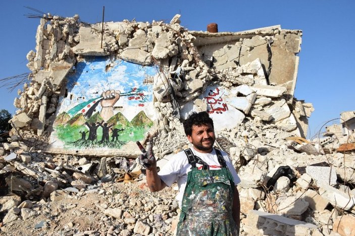 Suriyeli grafiti sanatçısı savaşın izlerini fırça darbeleriyle siliyor -3
