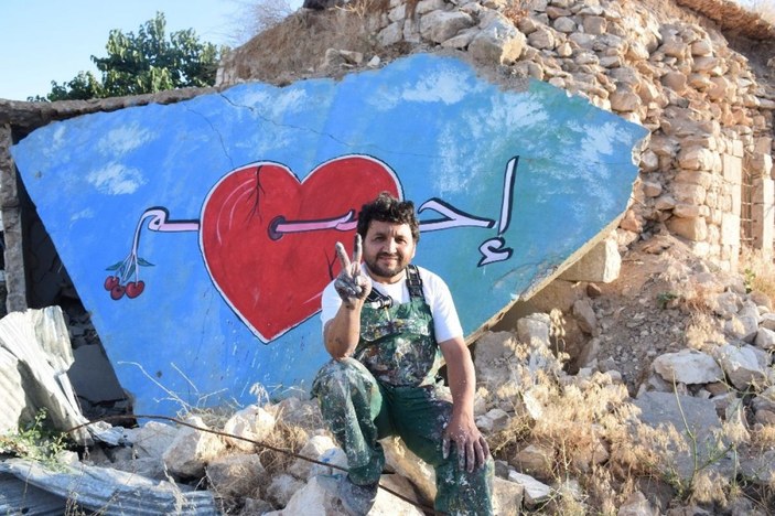 Suriyeli grafiti sanatçısı savaşın izlerini fırça darbeleriyle siliyor -1