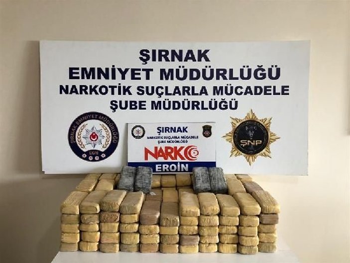 Şırnak'ta terörün finans kaynaklarına operasyon: 82 kilo eroin ele geçirildi -1