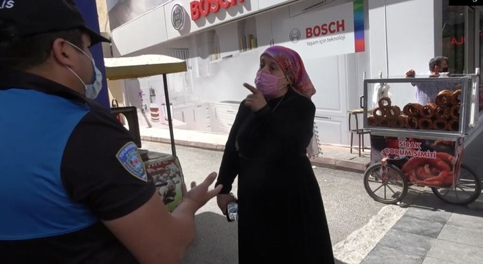 Maske takmayan kadın, polisle tartıştı -5