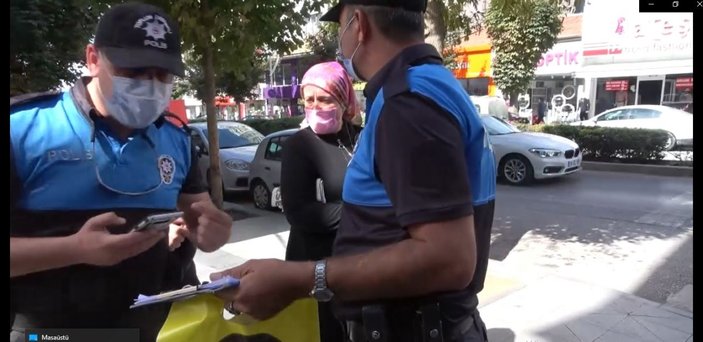 Maske takmayan kadın, polisle tartıştı -3