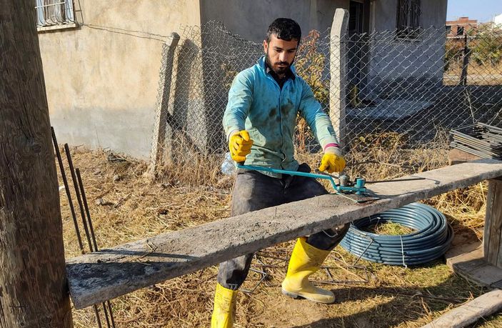 Batmanlı milli sporcu, asker harçlığı için inşaatta çalışıyor