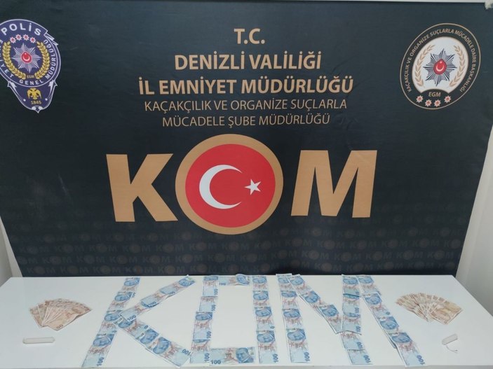 Sahte paraya orijinal hissi vermek için mum kullanmışlar -1