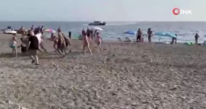 Uyuşturucu kaçakçısı sahilde güneşlenen vatandaşlar tarafından yakalandı -1