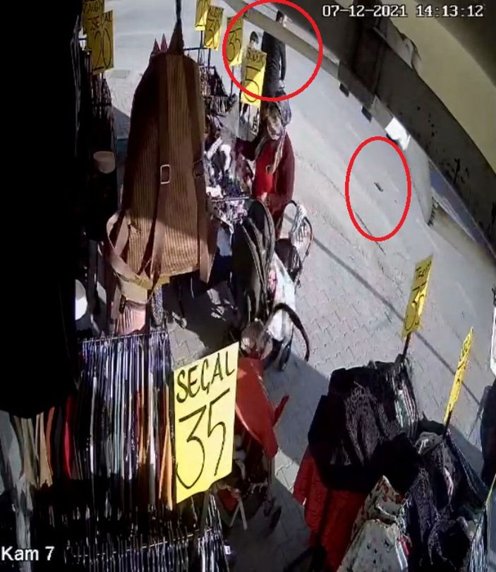 d Yere düşen cüzdanı çocuğa aldırıp, cebine attı, güvenlik kamerasına yakalandı -3
