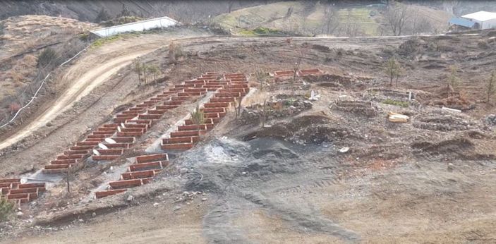 Su altında kalacak Yusufeli'de mezarlar taşınıyor -1