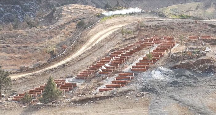 Su altında kalacak Yusufeli'de mezarlar taşınıyor -6