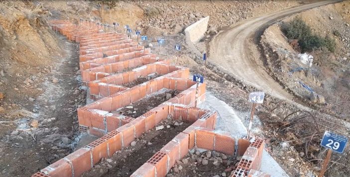 Su altında kalacak Yusufeli'de mezarlar taşınıyor -5