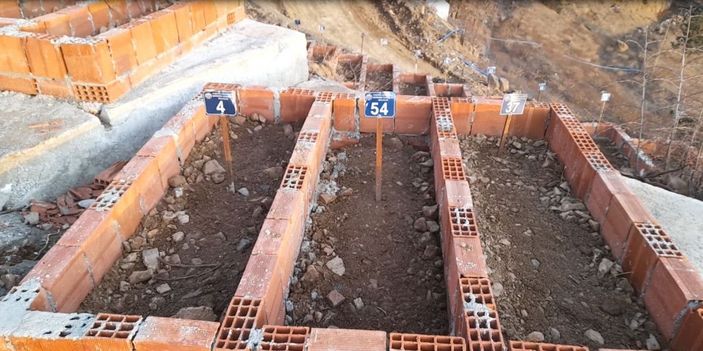 Su altında kalacak Yusufeli'de mezarlar taşınıyor -4