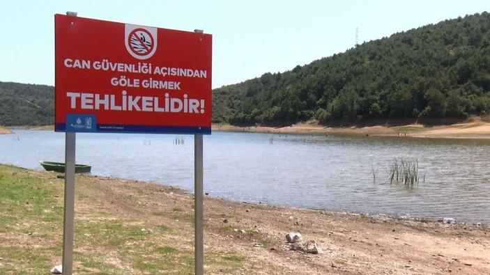 Tehlikeli uyarısına aldırmadan gölde yüzdüler -3