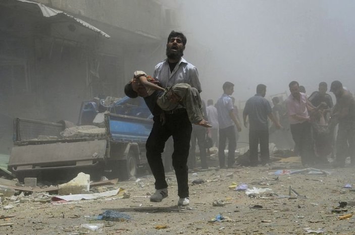 Esad güçleri Suriye'yi kana buladı: 64 ölü