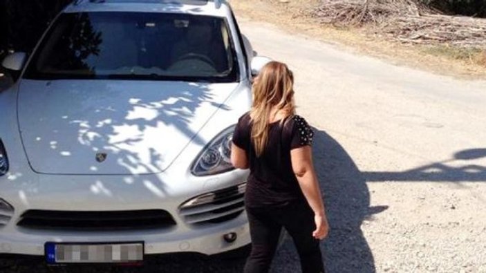 Porsche'lu kızın eczanesine molotoflu saldırı