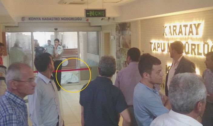 Tapu Müdürlüğü'nde işlemler cesedin yanında devam etti