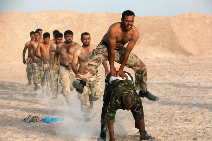 Irak'ta Şii militanların eğitim görüntüleri tartışılıyor