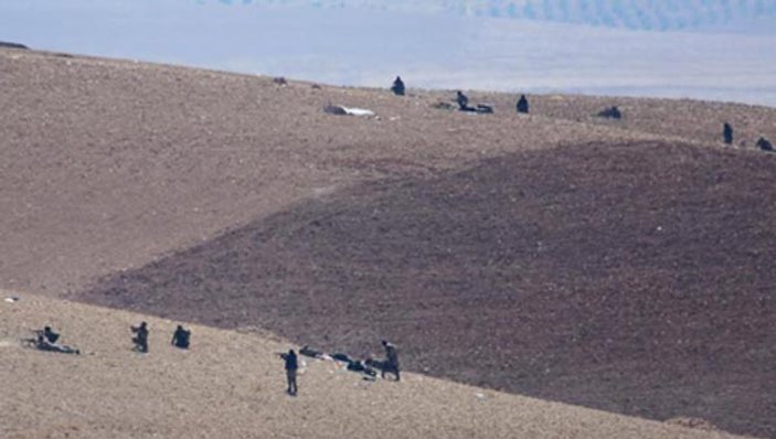 Kobani'ye saldıran IŞİD militanları sınırdan görüntülendi