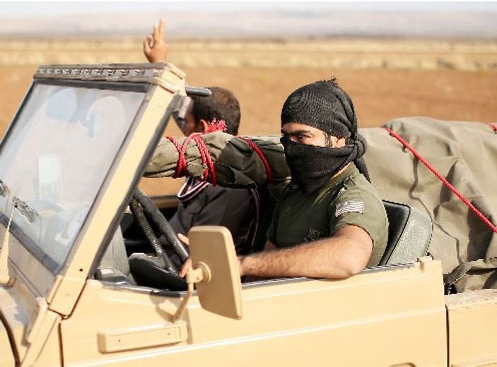 ABD üniformalı peşmergeler Kobani'ye gidiyor