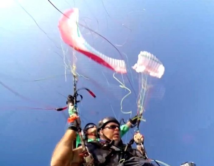 190 kiloluk yolcuya dayanamayan paraşüt havada parçalandı İZLE