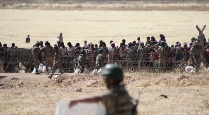 Kobani'de silah sesleri yükselmeye devam ediyor