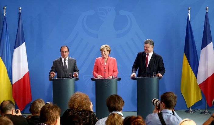 Merkel ve Hollande sığınmacılarla ilgili konuştu