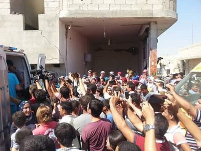 Aylan anne ve abisi ile Kobani'de toprağa verildi